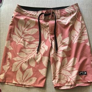Rip Curl Pink and White Board Shorts with Tropical Floral Design